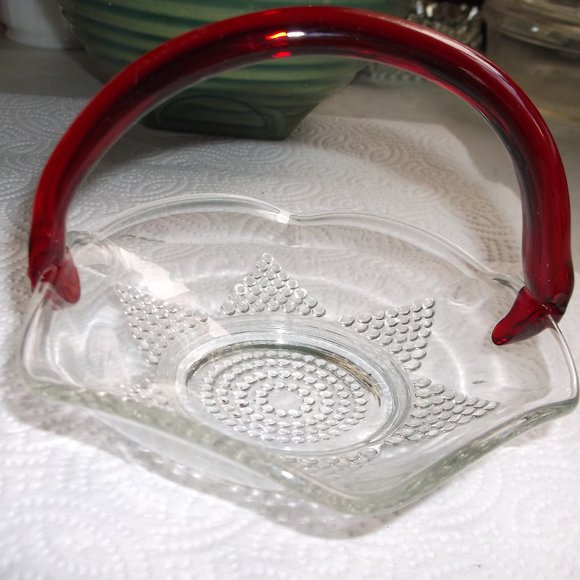 pressed glass bowl .applied handle. vintage